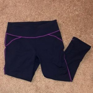 Fabletics Lima Capri in Navy with Purple Stitching